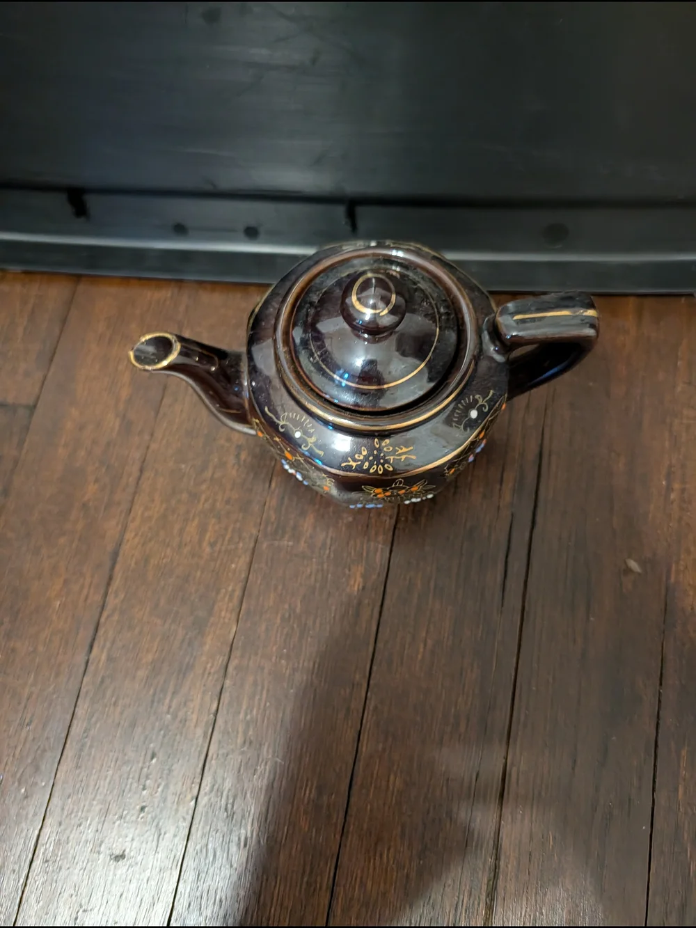 Brown Ceramic Teapot with Hand-Painted Floral Detail